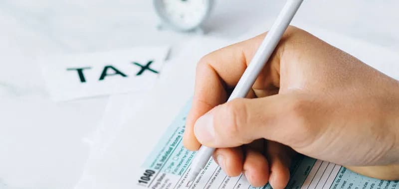 Writing on tax paper